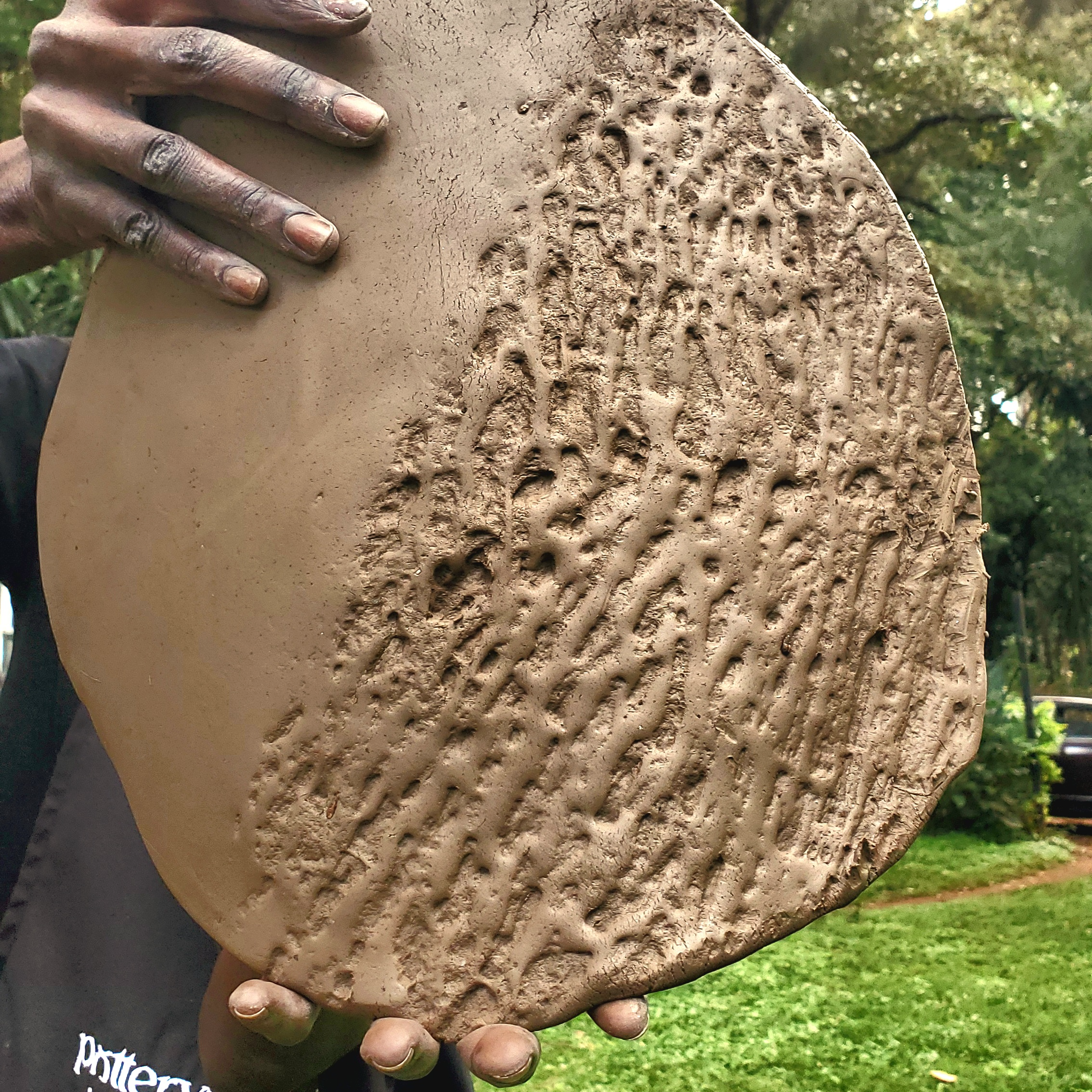 Rooted in Clay, Reaching Every Hand.